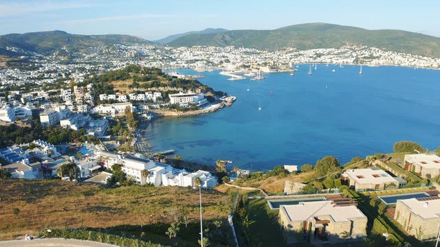 Slow rising shot over the hill. Releaving Bodrum bay and anceint Castle of St. Peter. Welcome to Turkey concept 4k