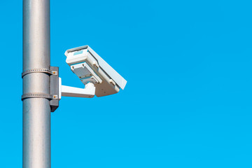 Traffic surveillance camera mounted on the post