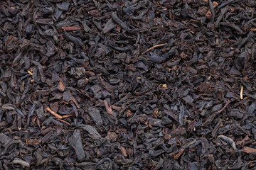 Black tea leaves texture close up for background