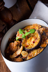 Veal goulash with baked aubergine and herbs