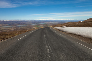 Asphalt road in the fjords of Iceland