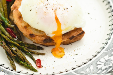 Toast with Poached Egg and Boiled Green Asparagus