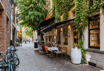 Old street of the historic city center of Antwerpen (Antwerp), Belgium. Cozy cityscape of Antwerp. Architecture and landmark of Antwerpen