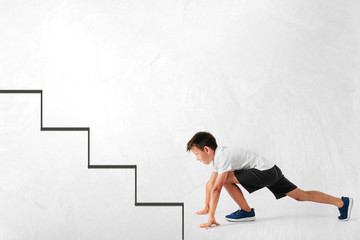 a growth business concept. young businessman climbing the career ladder