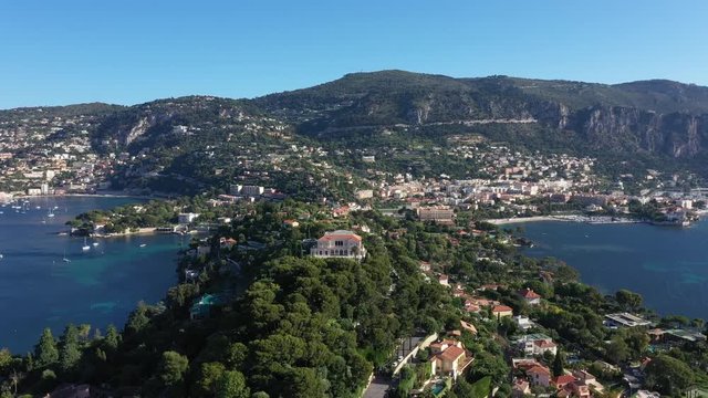 Villa Ephrussi aerial shot luxury area mountains in background