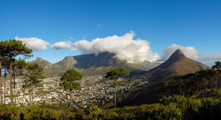 Foto op Canvas Cape Town City Bowl, Lions Head and a cloud covered and Table Mountain viewed from Signal Hill. Western Cape. South Africa. © Roger de la Harpe