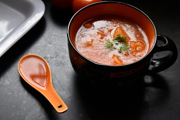 tamoto soup in bowl with spoon, food concept.