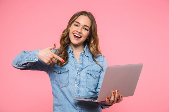 Happy Blonde Woman Wearing In Denim Shirt Holding Laptop Computer