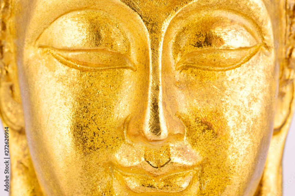 Wall mural gold buddha portrait, macro close up buddha face portrait, closed eyes buddha.