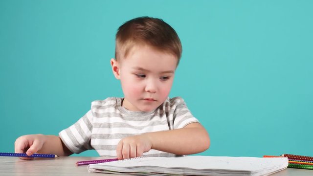 Boy Drawing a Picture for Father Day. Loving Son Makes a Gift for his Father