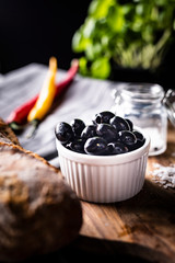 Black olives, tasty healthy snack. A healthy Mediterranean diet. 