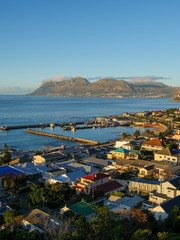 Dramatic early morning view from Boyes Drive of Kalk Bay and, in the distance, Simonstown. Cape Town. Cape Peninsula. Western Cape. South Africa