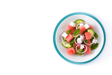 Watermelon salad with feta cheese isolated on white background. Top view. Copyspace