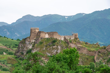 Fototapeta na wymiar Atskuri fortress in georgian countryside. Traveling in caucasus, beautiful Georgia
