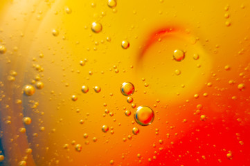 drops of water on orange background