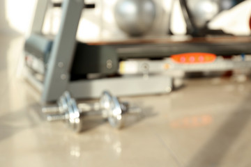Modern equipment in gym, blurred view