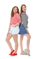 Portrait of happy young women on white background