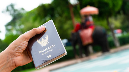 Traveler holding Thailand passport in Ayutthaya Province Thailand
