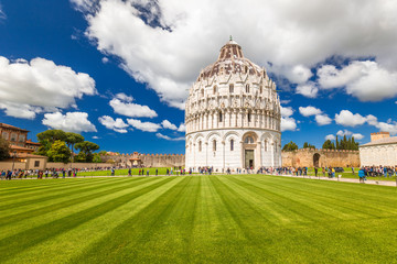 The Pisa Baptistery of St. John in Square of Miracles at sunny day, Tuscany region, Italy.