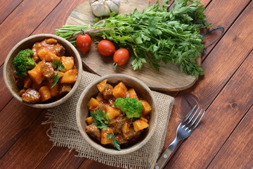 Traditional homemade Hungarian beef meat stew, Goulash with potatoes, carrots , tomatoes, broccoli in a bowl