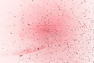 Vintage pink background. Rough painted wall of fiesta color. Imperfect plane of rosy colored. Uneven old decorative toned backdrop of rouge tint. Texture of pink hue. Ornamental stony surface.