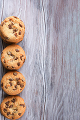 Cookies with chocolate closeup. Homemade cookies. Piles of cookies lie vertically.