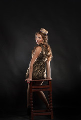 young lovely expression woman in crown