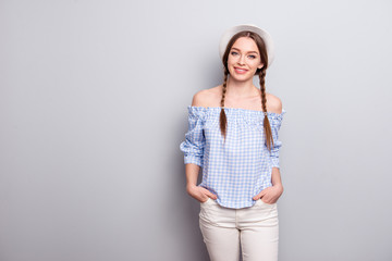 Portrait cute nice pretty lady person content satisfied rejoice enjoy free time weekend holiday place hands palms pocket beige trousers modern ckeckered shirt off-shoulders isolated  argent background