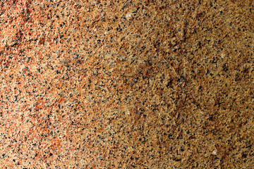 natural motley stone texture background with a light gradient