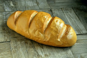 fresh bread on a wooden background