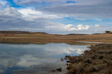 Sotonera lake landscape at cloudy day with nice reflections