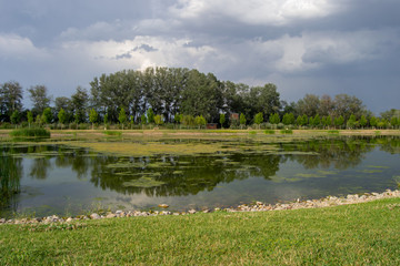 Plaza Park on Zaragoza Landscape with a lae green colors and nature