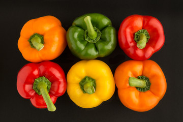 Vertical image of mixed peppers