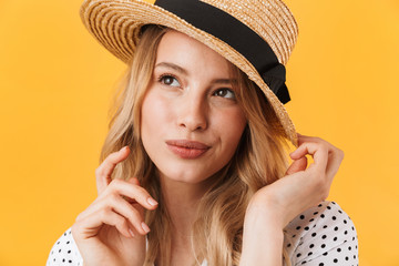 Beautiful young blonde woman wearing summer dress