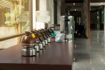Hot Coffee brake pitcher set for service,many pitcher of hot coffee espresso on the table and light background