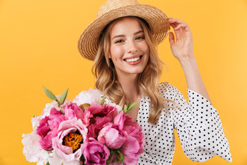 Beautiful young blonde woman wearing summer dress