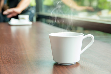Hot Coffee brake set,cups of hot coffee espresso on the table and light background