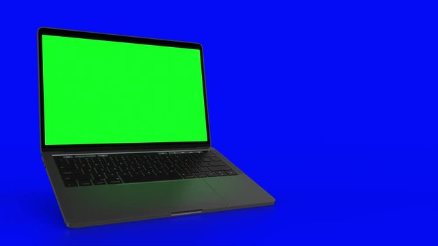 4K Video. Laptop (Notebook) Turning On With green Screen On A blue Background.