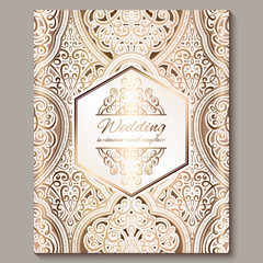 Wedding invitation card with gold shiny eastern and baroque rich foliage. Ornate islamic background for your design. Islam, Arabic, Indian, Dubai.