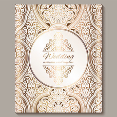 Wedding invitation card with gold shiny eastern and baroque rich foliage. Ornate islamic background for your design. Islam, Arabic, Indian, Dubai.