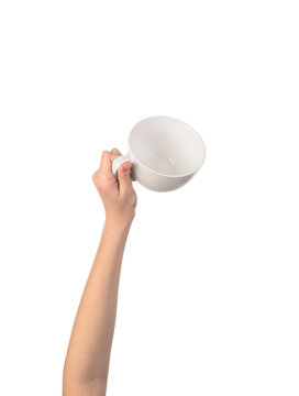 White Cup In The Womens Hand Isolated