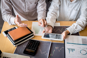 Business team on meeting to planning investment trading project and strategy of deal on a stock exchange with partner, financial and accounting concept, collaborative teamwork analyze data