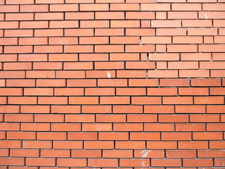 Background wall of brown smooth bricks. Copy space...