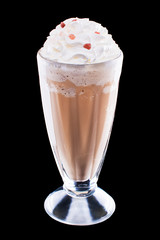 Cold coffee drink or cocktail with cream on black isolated background