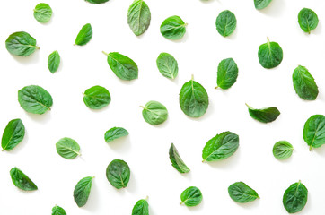 Top view of mint herbs on white background. Minimal raw herb concept design. - Image