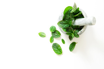 Fresh mint leafs in marble mortar bowl. - Image