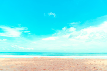 Tropical nature clean beach and white sand in summer with sun light blue sky and bokeh background.