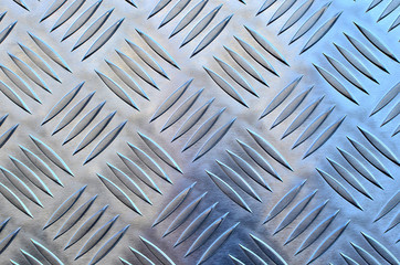 Metal floor with a corrugated surface close up. Corrugated aluminum sheet, diamondplate, background texture - Image