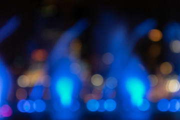 Defocused Blurred Abstract background of fountain light with colorful illuminations bokeh at night. Background Concept.