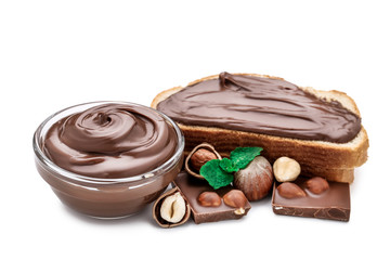 Melted chocolate with hazelnuts and bread isolated on white background